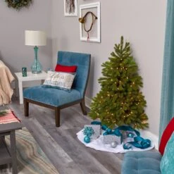 4' Cambridge Spruce Flat Back Artificial Christmas Tree With 100 Warm White (Multifunction) LED Lights And 221 Bendable Branches 18 4' Cambridge Spruce Flat Back Artificial Christmas Tree With 100 Warm White (Multifunction) LED Lights And 221 Bendable Branches -Artificial Trees Store artificial 4 cambridge spruce flat back artificial christmas tree with 100 warm white multifunction led lights and 221 bendable branches nearly natural 661047