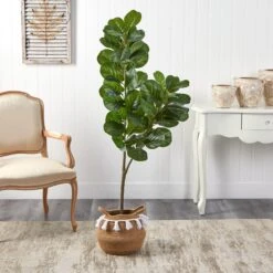 4.5’ Fiddle Leaf Fig Tree With Boho Chic Handmade Natural Cotton Woven Planter With Tassels -Artificial Trees Store artificial 45 fiddle leaf fig tree with boho chic handmade natural cotton woven planter with tassels nearly natural 943269